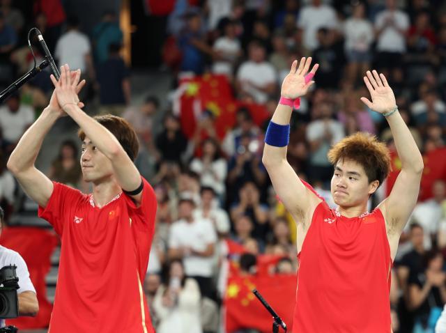 博鱼体育直播-奥运首秀摘银，梁伟铿/王昶在遗憾中成长